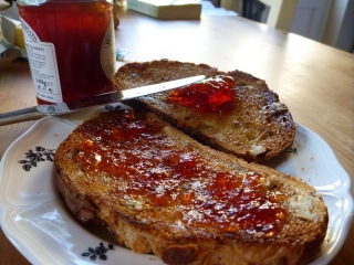 Homemade crab apple jelly on buttered not-homemade toast... mmm.