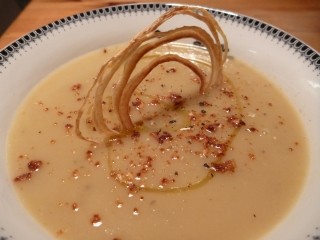 Jerusalem artichoke soup, simple and perfect. Or nonced up with a dried onion ring!