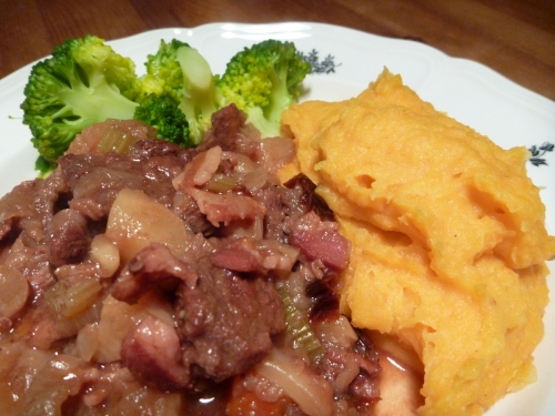 Rich game stew, served up with sweet potato mash and broccoli