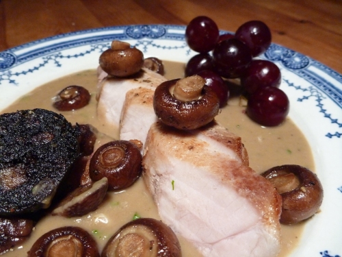 Autumn on a plate: chestnuts, grapes, mushrooms with pork tenderloin