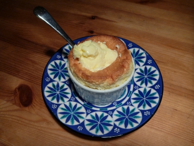 One more ingredient in the simple lemon souffle - a scoop of ice cream shoved in the top!
