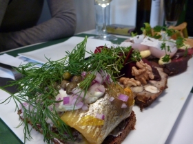 Smorrebrod, tasty open sandwiches. Check out the curried pickled herring!