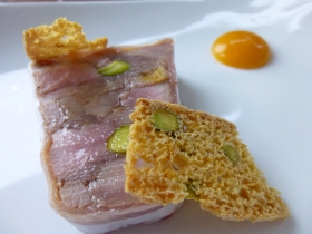 Sturdy piece of duck terrine with apricot puree